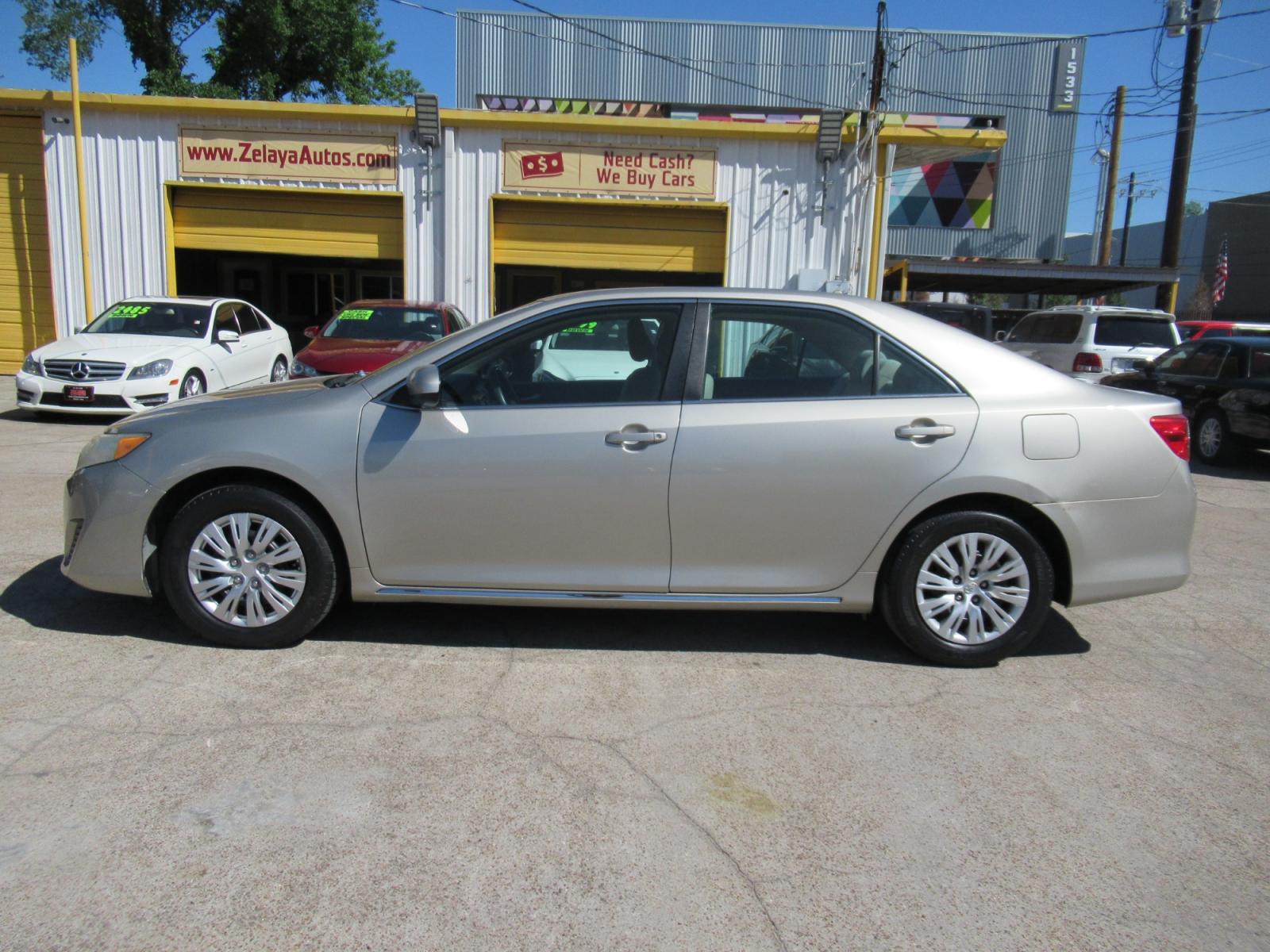 2014 /Tan Toyota Camry L (4T4BF1FK2ER) with an 2.5L L4 DOHC 16V engine, Automatic transmission, located at 1511 North Shepherd Dr., Houston, TX, 77008, (281) 657-1221, 29.798361, -95.412560 - 2014 TOYOTA CAMRY LE VIN: 4T4BF1FK2ER364962 4 T 4 B F 1 F K 2 E R 3 6 4 9 6 2 SEDAN 4 DR 2.5L I4 F DOHC 16V GASOLINE FRONT WHEEL DRIVE - Photo #0